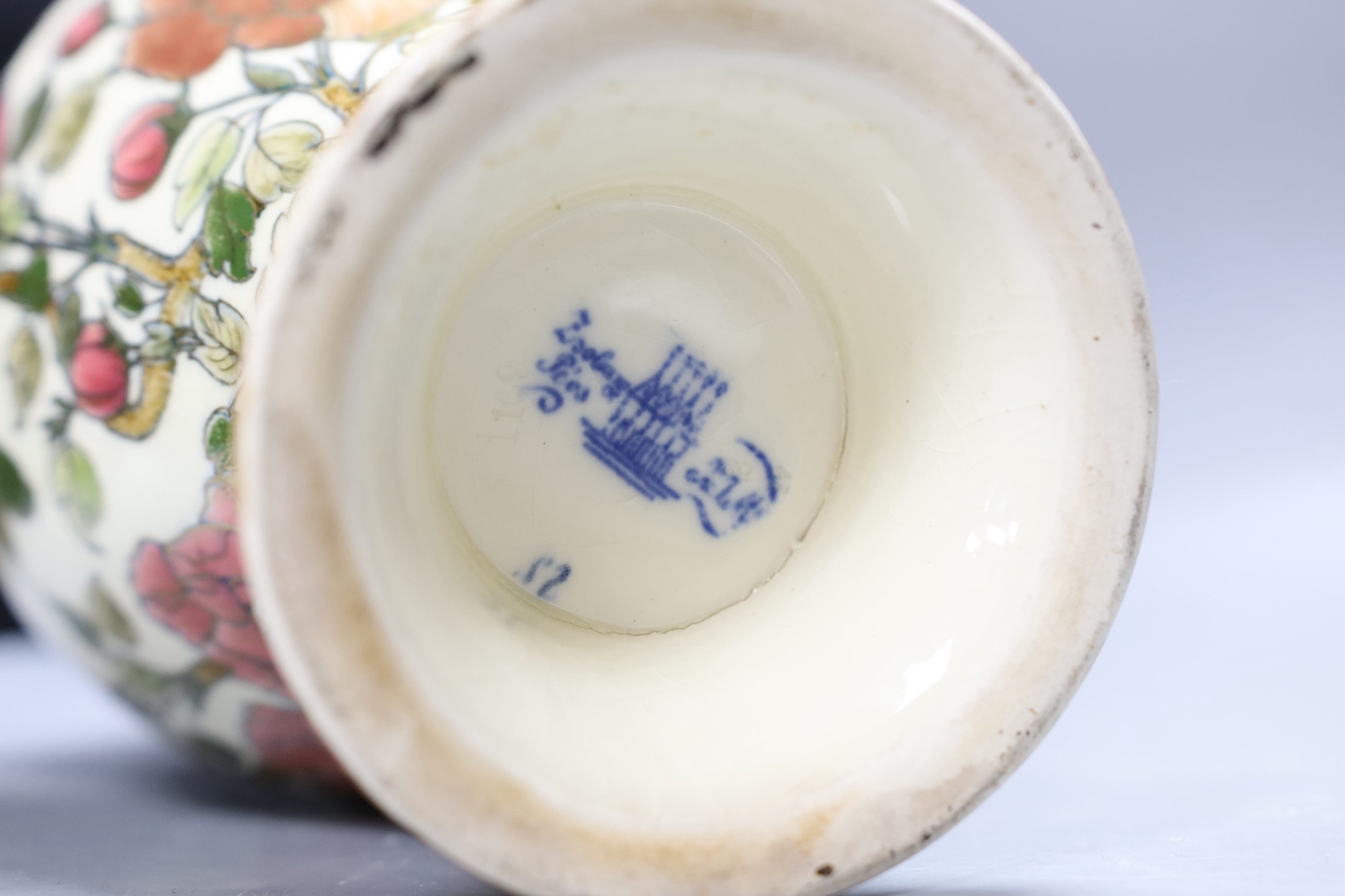 An early 20th century Zsolnay Persian style pottery vase. 26cm tall